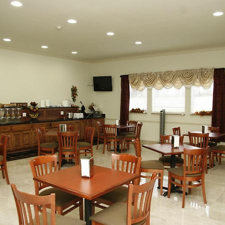 Budget Host Inn And Suites Cameron Quarto foto